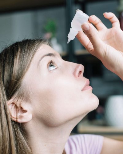 close-up-woman-putting-eye-drops (1)