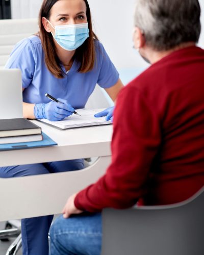 female-doctor-conducts-a-medical-interview-with-th-DV2BRKK (1)