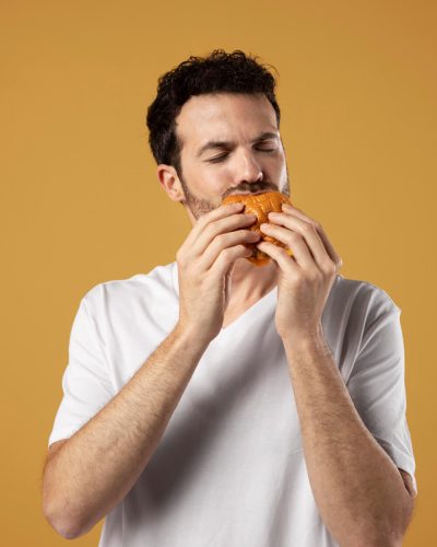 man-enjoying-eating-burger (1)