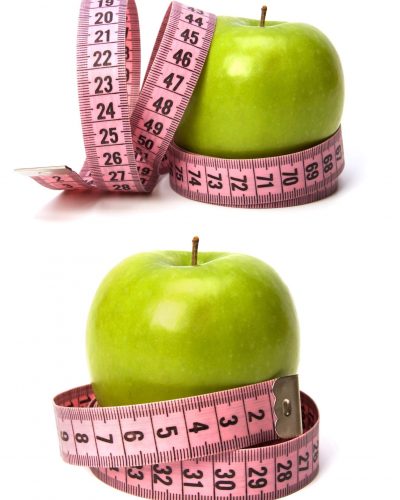 tape-measure-wrapped-around-the-apple-isolated-on--42HMSE5 (1)