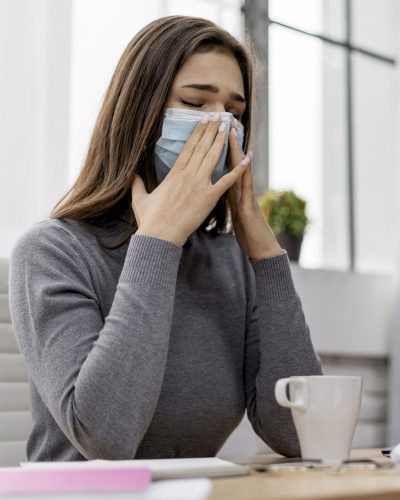 woman-wearing-face-mask-while-working-from-home